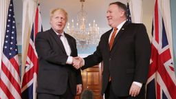 WASHINGTON, DC - MAY 07:  British Foreign Secretary Boris Johnson (L) and U.S. Secretary of State Mike Pompeo pose for photographs ahead of meetings at the U.S. State Department's Harry S. Truman headquarters building May 7, 2018 in Washington, DC. Johnson is in the United States in part to argue for the Trump Administration to continue to be a party to the 2015 Iran nuclear deal. "The wisest course would be to improve the handcuffs rather than break them", Johnson wrote in an editorial in the New York Times.  (Photo by Chip Somodevilla/Getty Images)