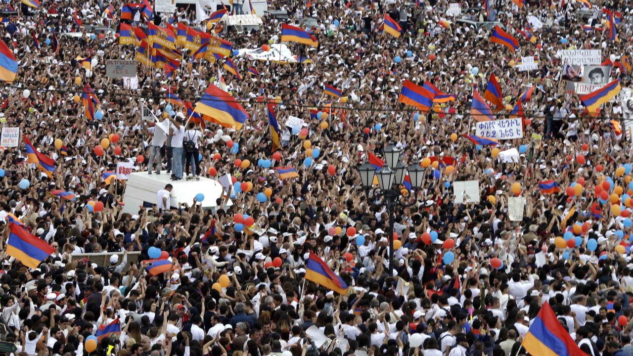Pashinyan's supporters celebrate his victory Tuesday.