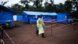 TOPSHOT - A health worker walks at an Ebola quarantine unit on June 13, 2017 in Muma, after a case of Ebola was confirmed in the village.
Two cases of the Ebola virus have been confirmed in a laboratory while 18 others are suspected in the remote Bas-Uele province, an equatorial forest zone near the Central African Republic. It is the first outbreak of Ebola, which spreads by contact with bodily fluids, since the west Africa epidemic that ended in January last year after killing more than 11,300 people and sickening nearly 29,000. / AFP PHOTO / JOHN WESSELS        (Photo credit should read JOHN WESSELS/AFP/Getty Images)