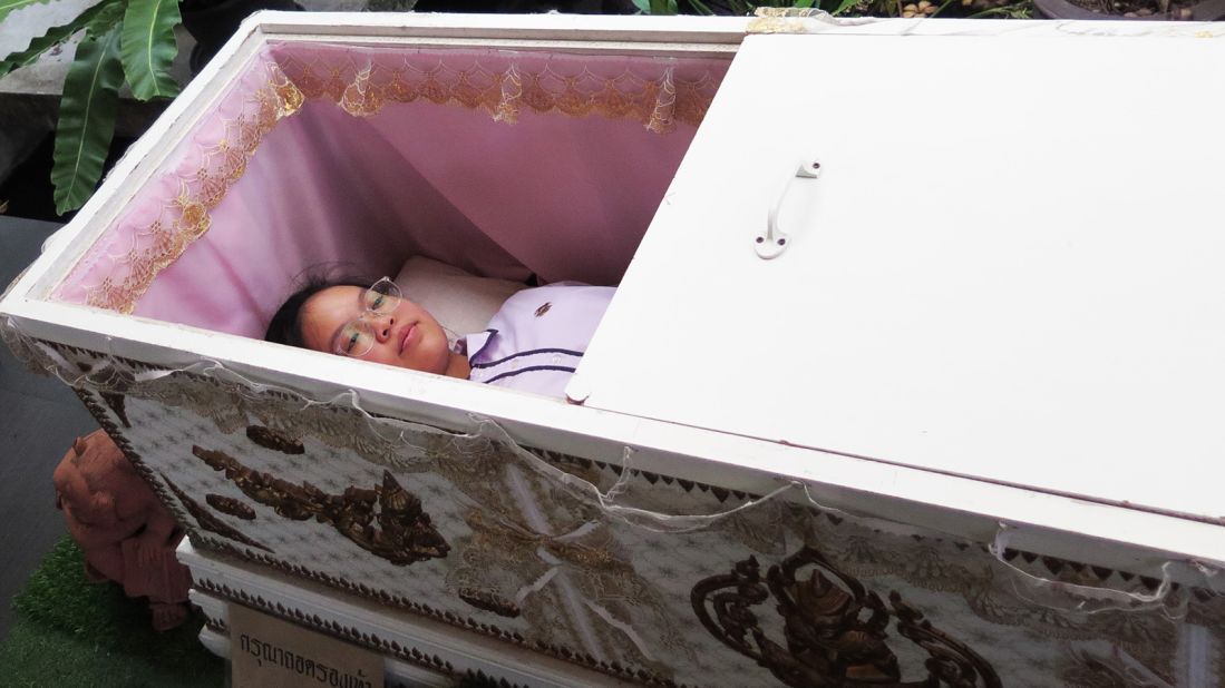 <strong>Could you pass the coffin test?:</strong> "When you are actually in the coffin, it feels like you are dead!" Tammy, 15, tells CNN Travel while emerging from the long rectangular box in Bangkok's new death-themed cafe.