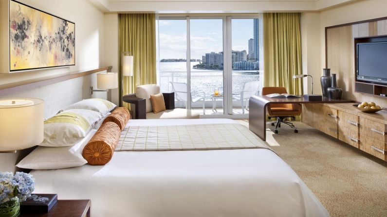 <strong>Mandarin Oriental, Miami: </strong>The interior is adorned with teak floors, cherry wood furnishings and silk-covered wall panels, while the rooms boast luxurious goose-down bedding and oversized sliding windows.