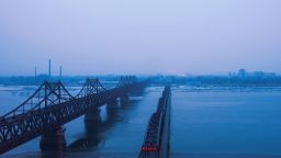 TOPSHOT - Fog is seen on the banks of the Yalu River in the Chinese border town of Dandong, opposite to the North Korean town of Sinuiju, on February 8, 2016. The UN Security Council strongly condemned North Korea's rocket launch on February 7 and agreed to move quickly to impose new sanctions that will punish Pyongyang for "these dangerous and serious violations. "With backing from China, Pyongyang's ally, the council again called for "significant measures" during an emergency meeting held after North Korea said it had put a satellite into orbit with a rocket launch. AFP PHOTO / JOHANNES EISELE / AFP PHOTO / JOHANNES EISELE        (Photo credit should read JOHANNES EISELE/AFP/Getty Images)