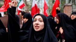 Iranian women chant slogans during an anti-US demonstration outside the former US embassy headquarters in the capital Tehran on May 9, 2018. - Iranians reacted with a mix of sadness, resignation and defiance on May 9 to US President Donald Trump's withdrawal from the nuclear deal, with sharp divisions among officials on how best to respond.
For many, Trump's decision on Tuesday to pull out of the landmark nuclear deal marked the final death knell for the hope created when it was signed in 2015 that Iran might finally escape decades of isolation and US hostility. (Photo by ATTA KENARE / AFP)        (Photo credit should read ATTA KENARE/AFP/Getty Images)
