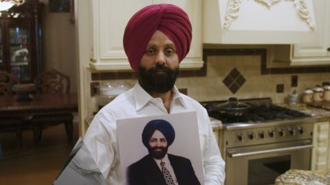 Rana Singh Sodhi holds a photo of his brother, Balbir Singh Sodhi, who was killed four days after the Sept. 11 terrorist attacks.