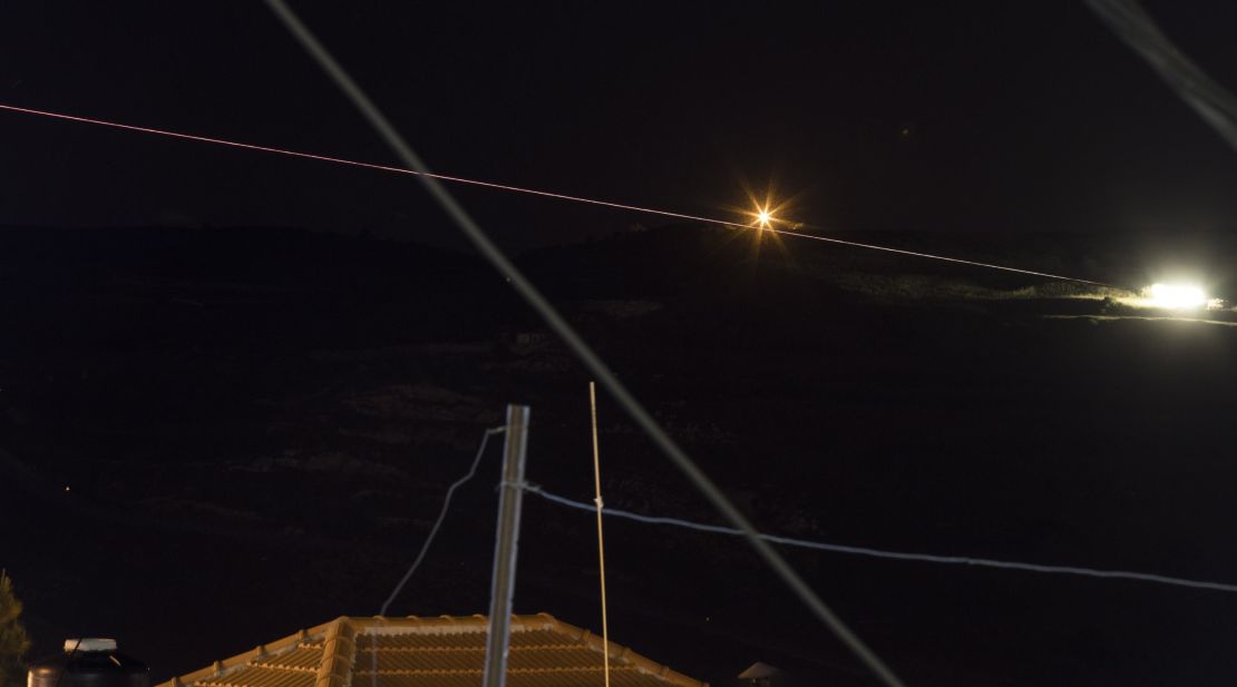 A long-exposure picture that reportedly shows Israeli missiles headed toward military targets in Syria.