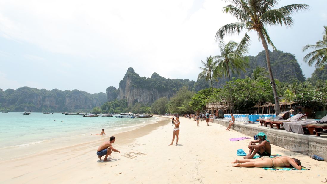 <strong>Railay West: </strong>Tourists hang out on Raiay West towards the end of a hot April day. 