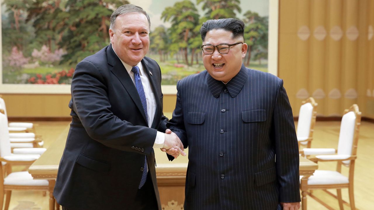 In this Wednesday, photo provided on Thursday by the North Korean government, US Secretary of State Mike Pompeo shakes hands with North Korean leader Kim Jong Un.