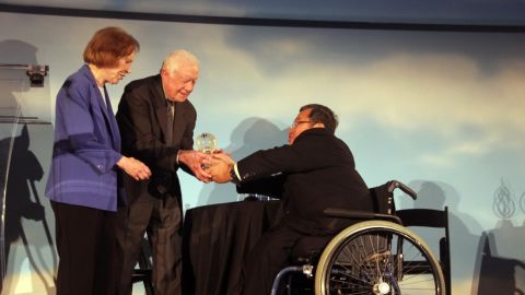 Former President Jimmy Carter and First Lady Rosalynn Carter accepted an award for global public health on Wednesday.