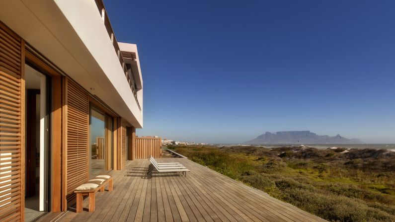 <strong>Big Bay Beach House, Cape Town, South Africa: </strong>Views of Cape Town's Table Mountain and Robben Island can be admired from this gorgeous vacation home.