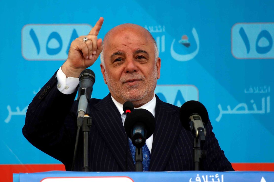 Iraqi Prime Minister Haider al-Abadi talks during a campaign rally in the holy city of Najaf  on May 3.