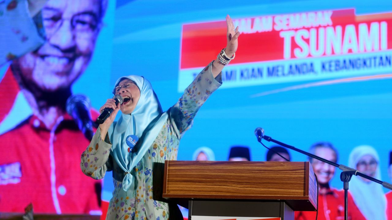 In this picture taken late May 6, 2018, Wan Azizah, wife of jailed former opposition leader and current Federal opposition leader Anwar Ibrahim, addresses supporters during a campaign rally in Kuala Lumpur ahead of the election to be held on May 9.