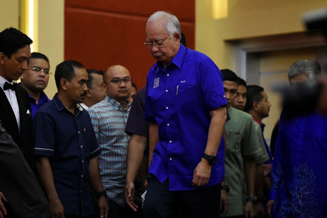 Outgoing Malaysian prime minister Najib Razak of the Barisan National party coalition arrives to address the media after his coalition's loss.