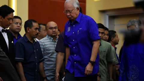 Outgoing Malaysian prime minister Najib Razak of the Barisan National party coalition arrives to address the media after his coalition's loss.