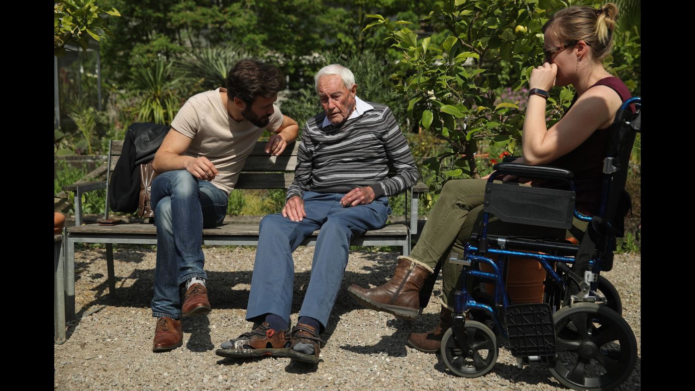 Australian scientist David Goodall, 104, sits with two of his grandchildren while touring botanical gardens in Basel, Switzerland, on Wednesday, May 9. Goodall, who had campaigned for the legalization of assisted dying in his home country, <a href="https://www.cnn.com/2018/05/10/health/david-goodall-australian-scientist-dies-intl/index.html" target="_blank">ended his life</a> the next day at a Swiss clinic. Goodall said he hoped his story would lead to the legalization of assisted dying in other countries.