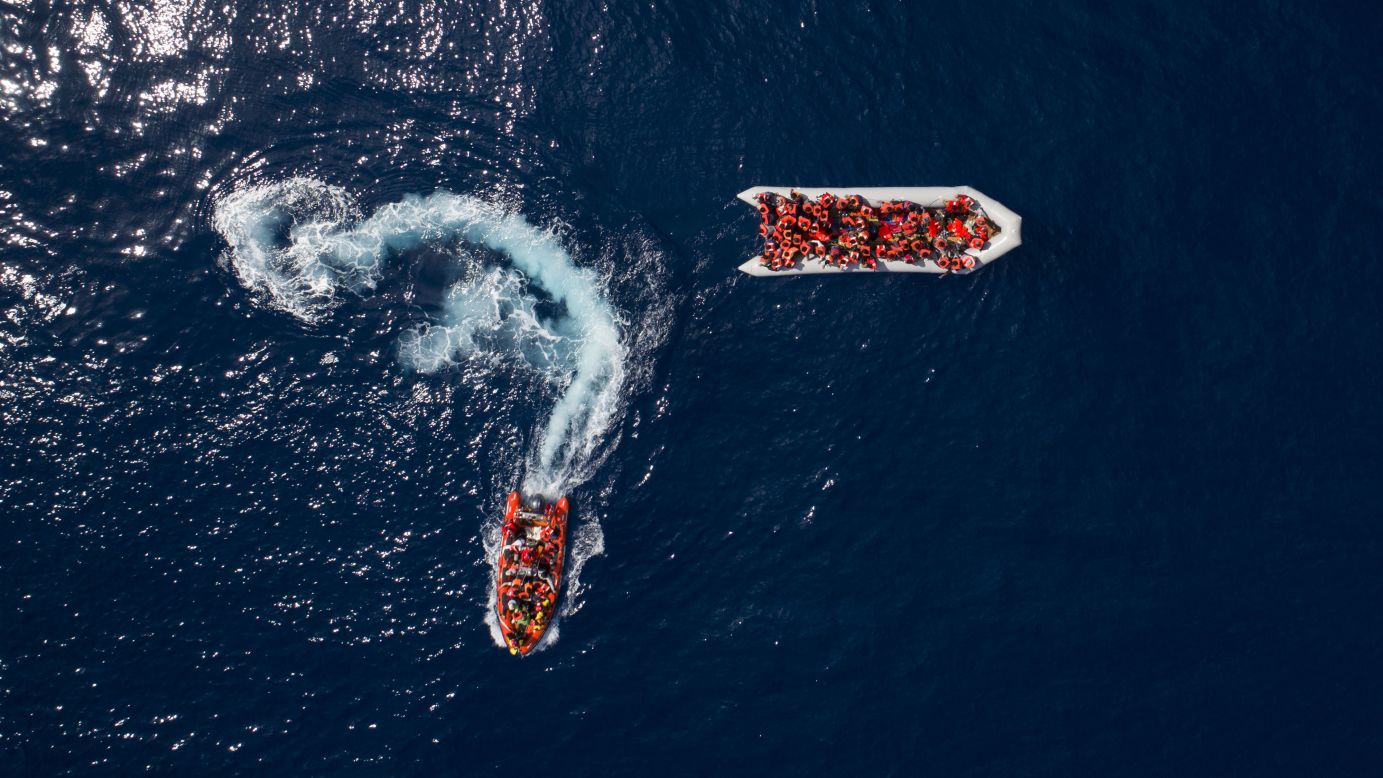 Migrants are rescued in the Mediterranean Sea, north of the Libyan coast, after trying to reach Europe aboard an overcrowded rubber boat on Sunday, May 6.