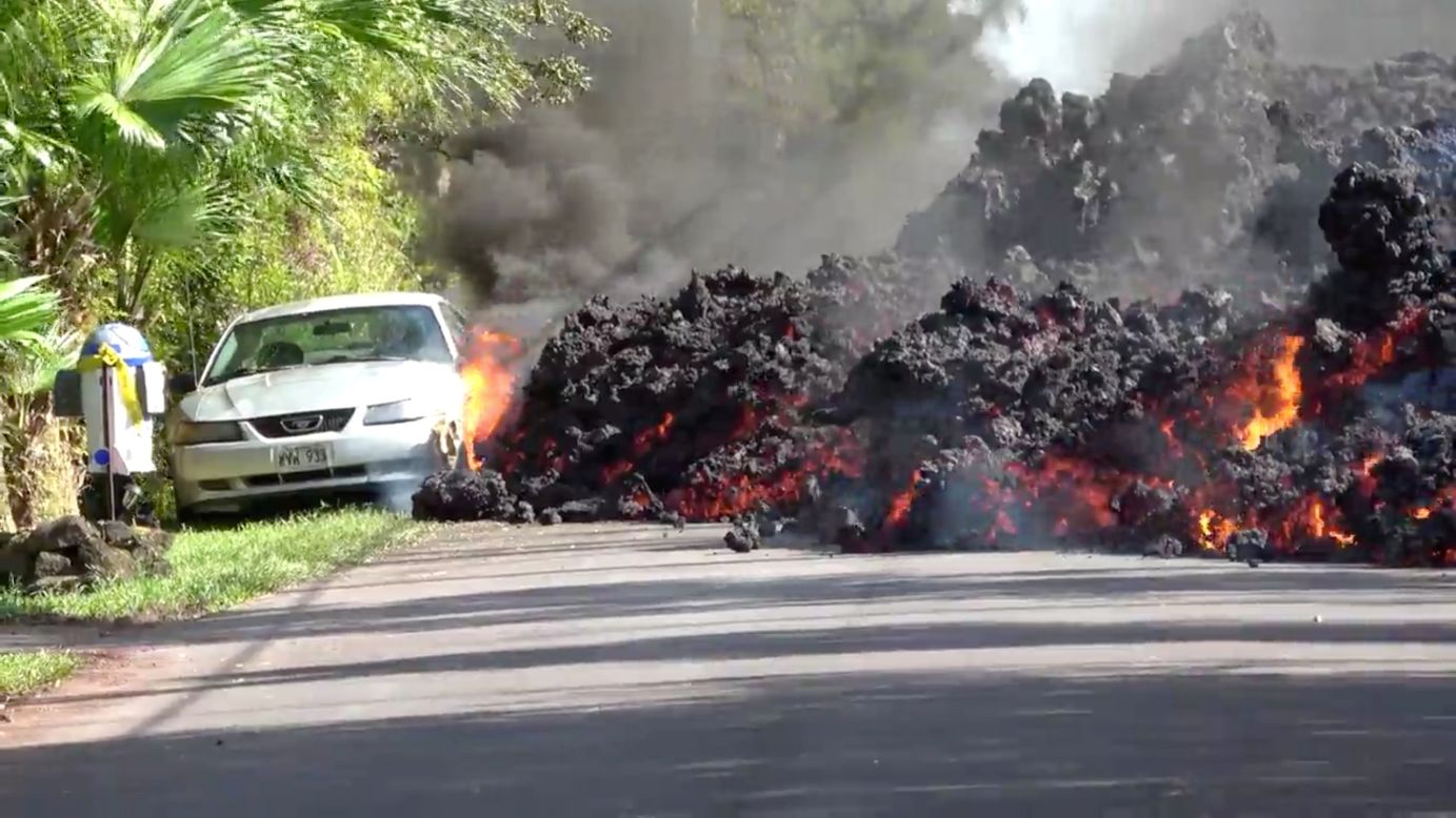Lava from the Kilauea volcano engulfs a sports car in Puna, Hawaii, on Sunday, May 6. A local resident <a href="https://www.cnn.com/2018/05/07/us/hawaii-kilauea-volcano-eruption-time-lapse/index.html" target="_blank">caught the incident on video.</a> The Kilauea volcano erupted last week, spewing molten rock and high levels of sulfur dioxide. Cracks emerged in the volcano's East Rift Zone -- an area of fissures miles away from the volcano's summit. Hundreds of people have been forced to evacuate their homes.