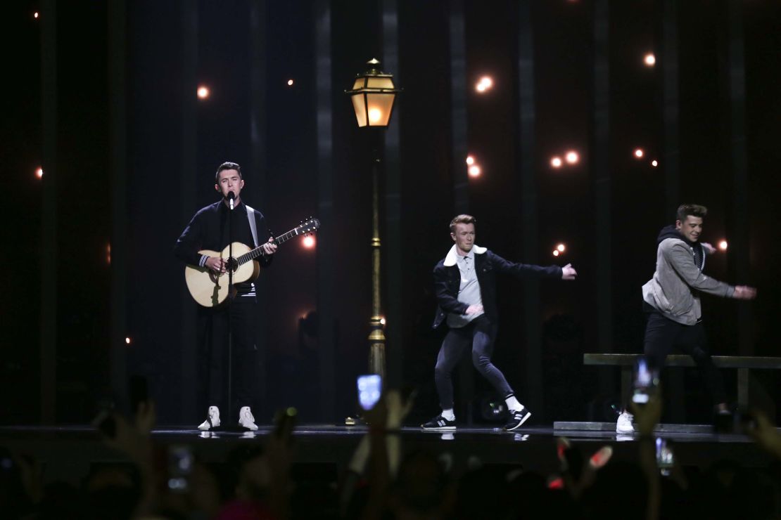 Ireland's Ryan O'Shaughnessy, left, performs with his dancers.