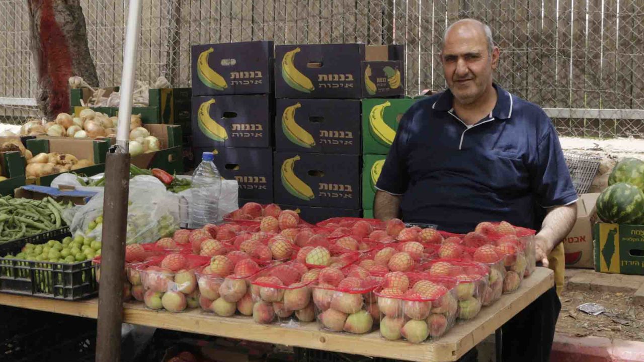 Khader Yousef, 53, works as a taxi driver and vegetable merchant at Bethlehem checkpoint.