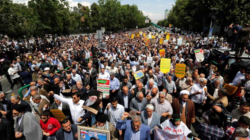 Iranians hold anti-US placards and shout slogans during a demonstration after Friday prayer in the capital Tehran on May 11, 2018. - Iran's foreign minister will embark on a diplomatic tour to try to salvage the nuclear deal amid high tensions following the US withdrawal and global fears over reports of unprecedented clashes with Israel in Syria. (Photo by STR / AFP)        (Photo credit should read STR/AFP/Getty Images)