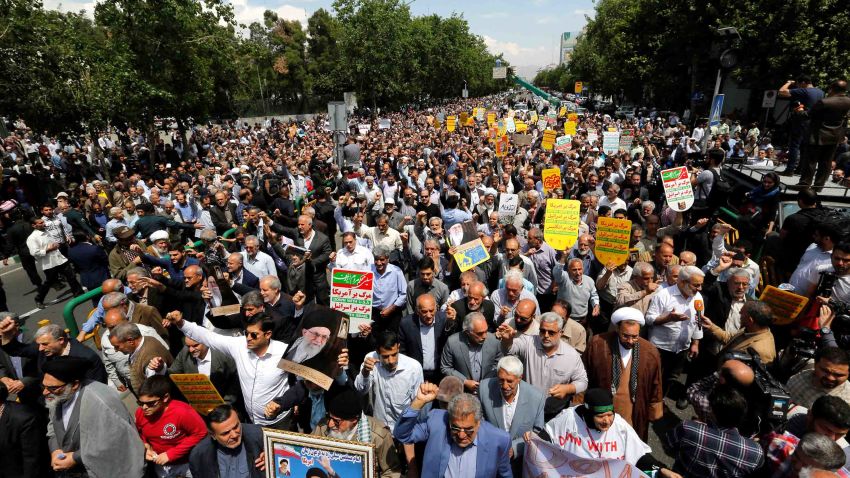 Iranians hold anti-US placards and shout slogans during a demonstration after Friday prayer in the capital Tehran on May 11, 2018. - Iran's foreign minister will embark on a diplomatic tour to try to salvage the nuclear deal amid high tensions following the US withdrawal and global fears over reports of unprecedented clashes with Israel in Syria. (Photo by STR / AFP) (Photo credit should read STR/AFP/Getty Images)