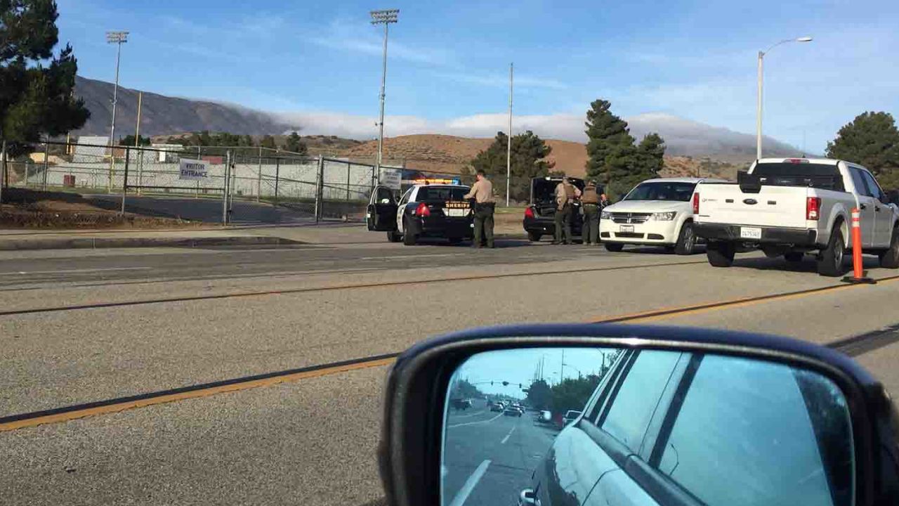 A parent, Nelson Melendez, says he took this picture near Highland High School on Friday morning. He said he was going to drop his kids off for school, but police told him to leave the area.