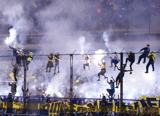 Fans of the the Argentine soccer club Boca Juniors celebrate after the team won the league on Wednesday, May 9.