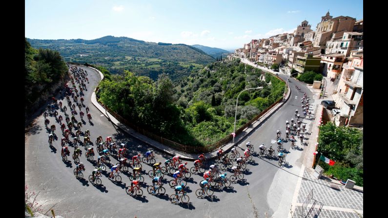 A pack of cyclists ride in Monterosso Almo, Italy, during the fourth stage of the Tour of Italy on Tuesday, May 8.