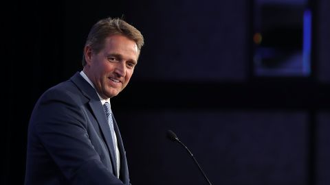 WASHINGTON, DC - JANUARY 25: Sen. Jeff Flake (R-AZ) delivers remarks during the U.S. Conference of Mayors 86th annual Winter Meeting at the Capitol Hilton January 25, 2018 in Washington, DC. Flake spoke during the conference's Childhood Obesity Prevention Awards Luncheon which was sponsored by the American Beverage Association, whose members include producers and bottlers of soft drinks, bottled water, and other non-alcoholic beverages. The non-partisan conference of mayors from cities with populations of 300,000 or larger meet annually in Washington, DC. (Photo by Chip Somodevilla/Getty Images)