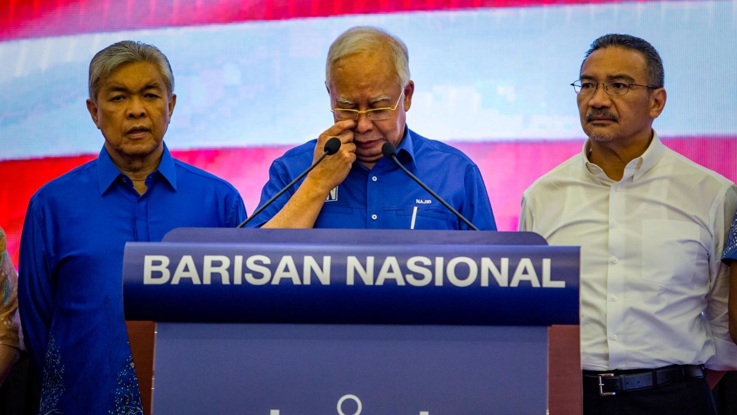 Former Prime Minister of Malaysia Najib Razak reacts after a shock election defeat which ended six decades of dominance by his Barisan Nasional coalition. 