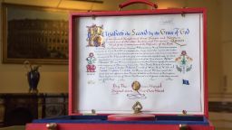 The 'Instrument of Consent', which is the Queen's historic formal consent to Prince Harry's forthcoming marriage to Meghan Markle, photographed at Buckingham Palace in London, Friday May 11, 2018.  Britain's Queen Elizabeth II signed, top right, the Instrument of Consent, her formal notice of approval for the wedding in elaborate calligraphic script issued under the Great Seal of the Realm.(Victoria Jones/Pool via AP)