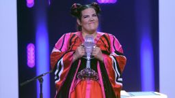 Israel's singer Netta Barzilai aka Netta celebrates with the trophy after winning the final of the 63rd edition of the Eurovision Song Contest 2018 at the Altice Arena in Lisbon, on May 12, 2018. 