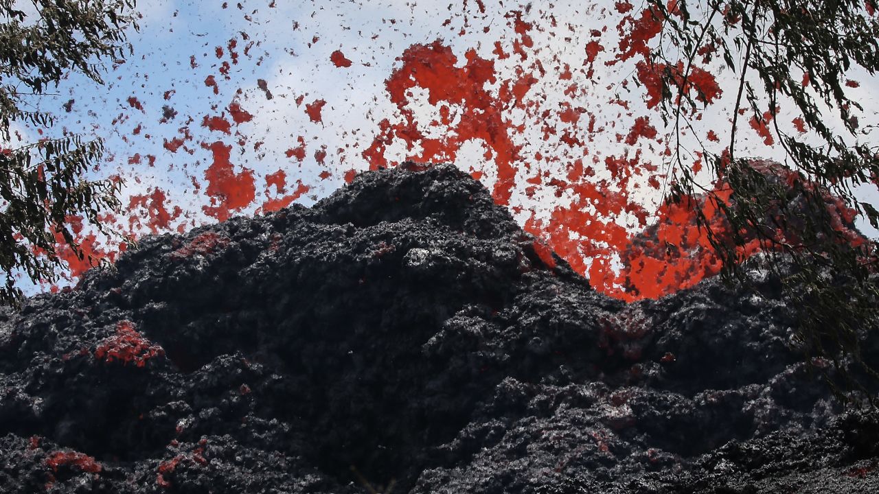 A fissure spews lava in Pahoa, Hawaii, after a massive eruption of the Kilauea volcano.