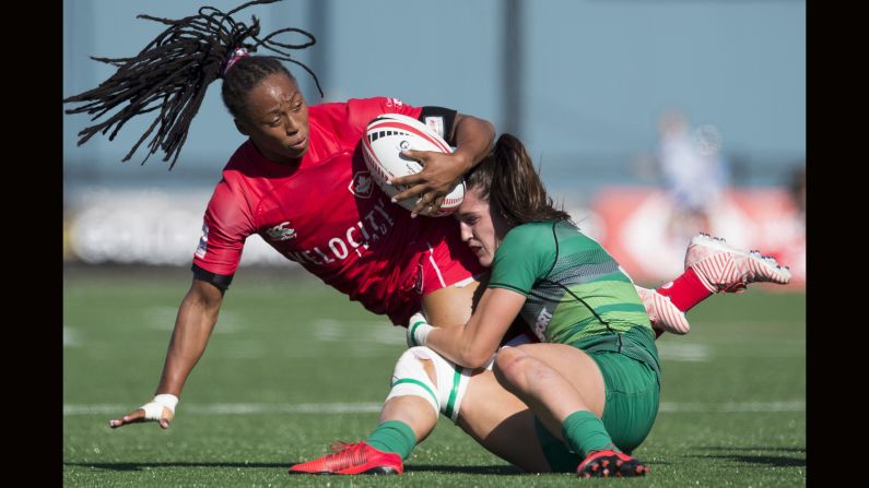 Canada's Charity Williams, left, is tackled by Ireland's Amee Leigh Murphy Crowe during the World Rugby Women's Sevens Series in Langford, British Columbia, on Saturday, May 12. 