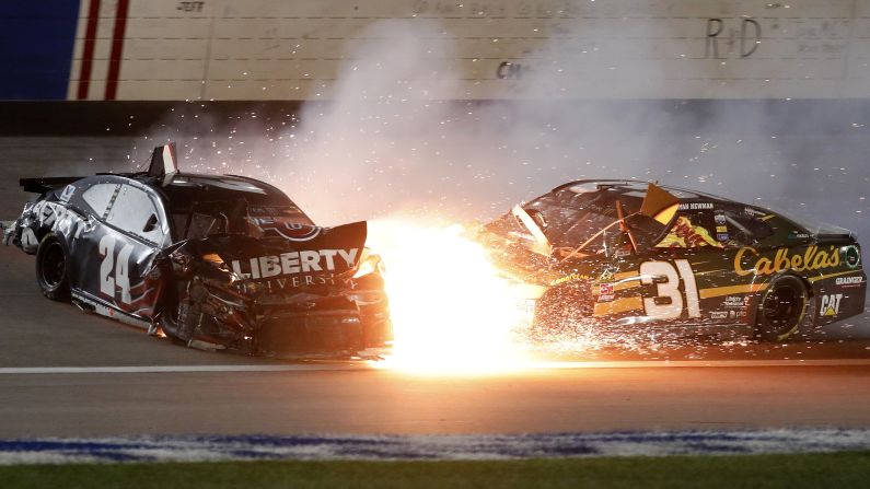 William Byron (24) and Ryan Newman (31) crash in turn 4 during the NASCAR Cup Series auto race at Kansas Speedway in Kansas City, Kansas, on Saturday, May 12. 