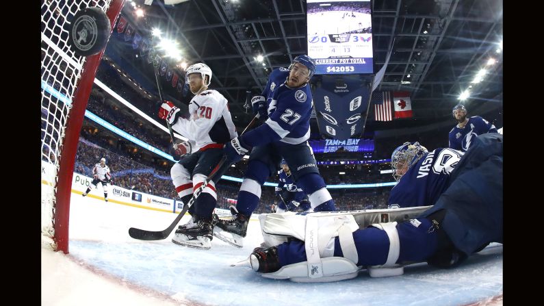 Lars Eller (20) of the Washington Capitals scores a goal against Andrei Vasilevskiy (88) of the Tampa Bay Lightning during the second period in Game 1 of the Eastern Conference Finals during the 2018 NHL Stanley Cup Playoffs at Amalie Arena on Friday, May 11, in Tampa, Florida.  