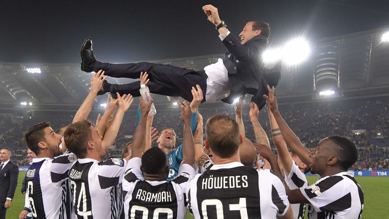 Juventus players and head coach  Massimiliano Allegri celebrate after winning the TIM Cup Final between Juventus and AC Milan at Stadio Olimpico on Wednesday, May 9, in Rome. 