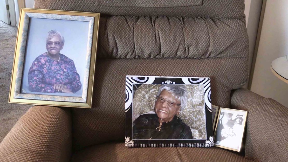In this frame from video, photos of Lessie Brown rest on a chair at her Ohio home. 