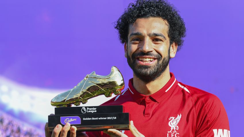 LIVERPOOL, ENGLAND - MAY 13: Mohamed Salah of Liverpool poses for a photo with his Premier League Golden Boot Award after the Premier League match between Liverpool and Brighton and Hove Albion at Anfield on May 13, 2018 in Liverpool, England. (Photo by Michael Regan/Getty Images)