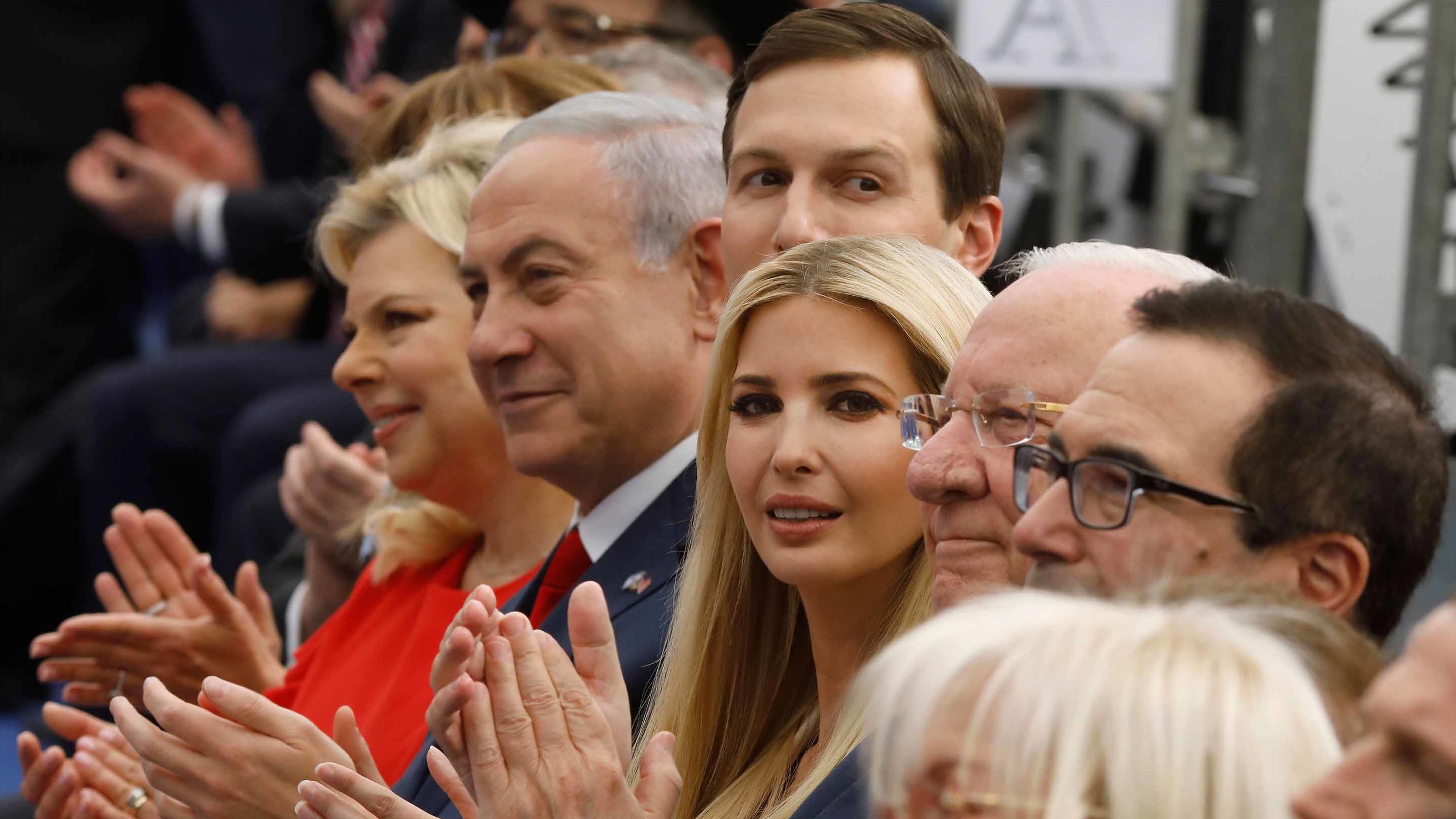 Benjamin Netanyahu (2nd L), his wife Sara Netanyahu (L), Jared Kushner (3rd L), Ivanka Trump (C) and US Treasury Secretary Steve Mnuchin (R) at Monday's ceremony.