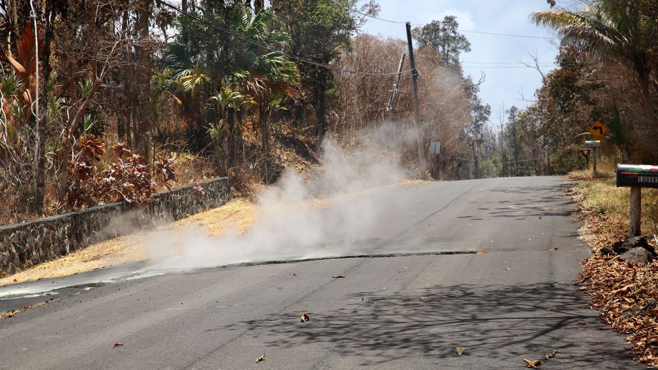 Toxic sulfur dioxide seeps out of the street in the community of Leilani Estates on the Big Island.