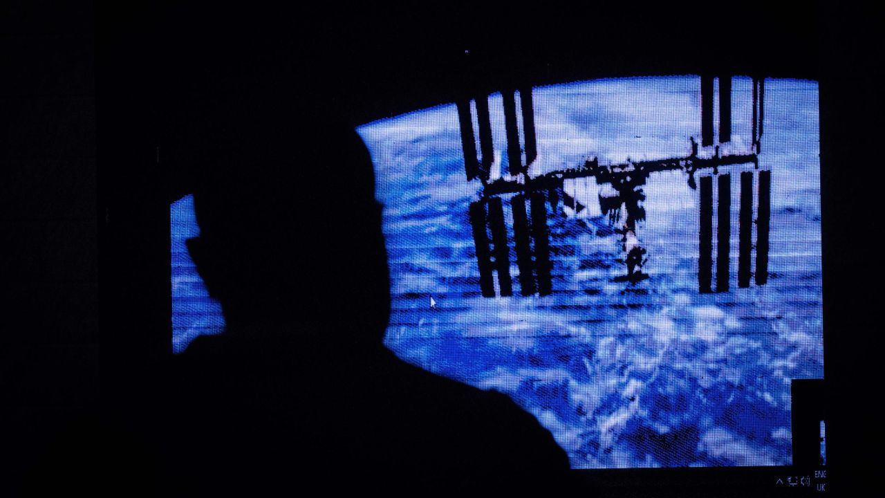 An image of the International Space Station (ISS) is projected during the public viewing of deployment of Kenyas first cube satellite at the University of Nairobi in Nairobi.