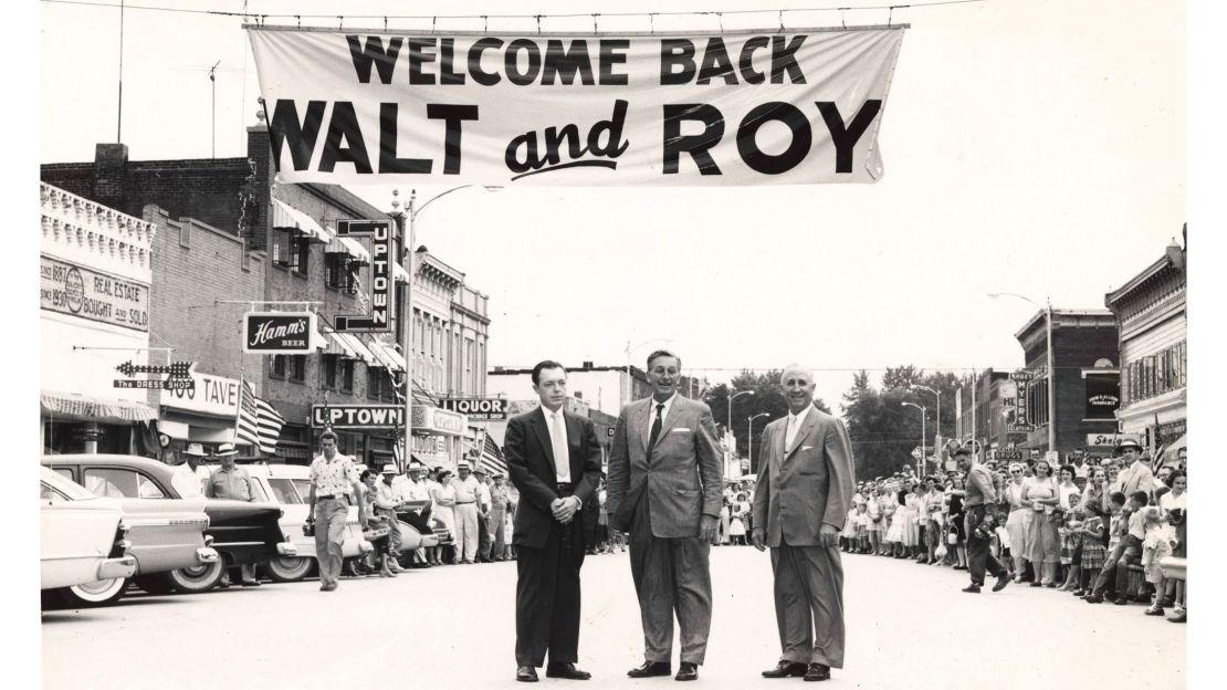 Walt, center, and Roy Disney, right, returned to Marceline in 1956.