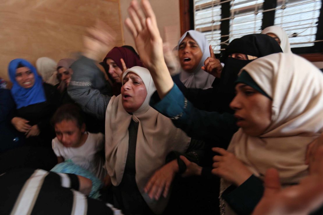 On Tuesday, women mourn the death of a Palestinian protester killed the day before in Gaza. 