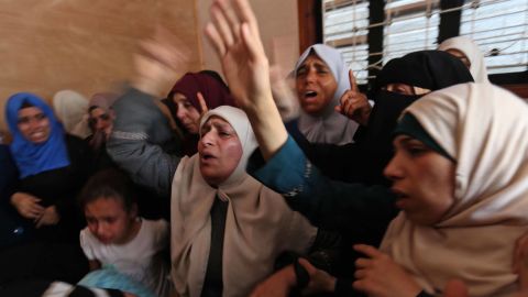 On Tuesday, women mourn the death of a Palestinian protester killed the day before in Gaza. 