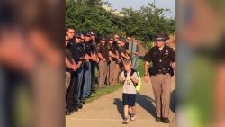 Cops escort boy to school