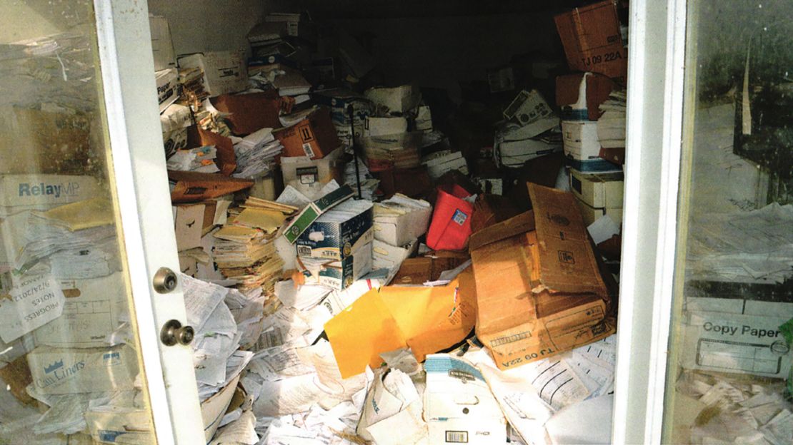 Court documents include photos of what may be patient records kept in an unsecure building.