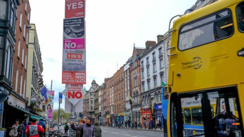 Posters for both campaigns on a lamp post in Dublin, Ireland.
