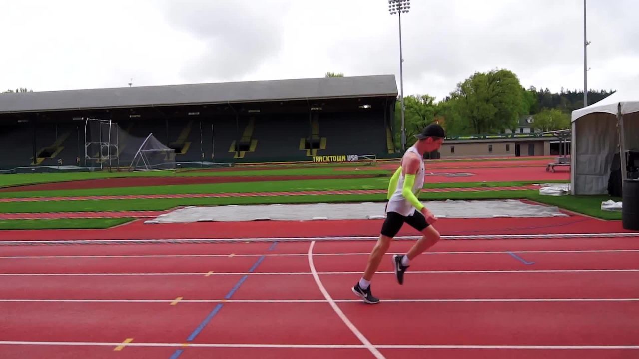 Gallegos running on a track.