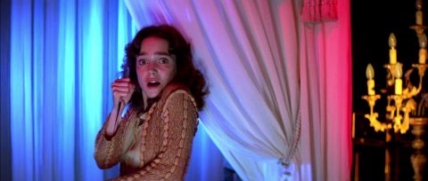 <strong>"Suspiria" --</strong> Not technically a house, the ballet boarding school in Dario Argento's '70s masterpiece is a sensory assault of saturated colors, lit in bright blues and reds. The sets wear Giuseppe Bassan's stagecraft on its sleeve, and owe its debt to grand guignol and the likes of "The Cabinet of Dr Caligari."