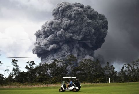 The eruption of the Kilauea volcano has destroyed houses, caused evacuations and threatened to wreak havoc on Hawaii's tourism industry but that didn't stop some golfers from carrying on with their game and playing a few rounds.